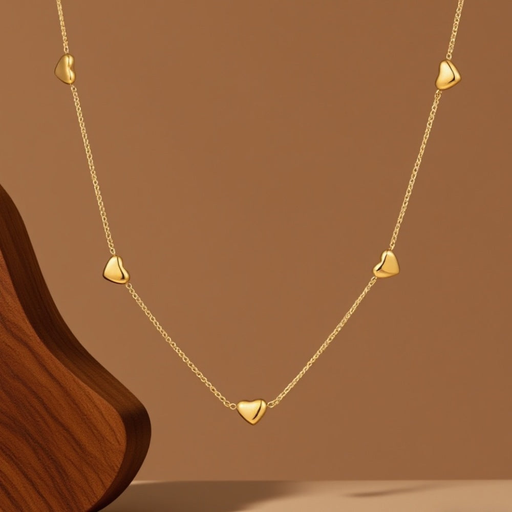 Collar corazón en color oro – ocho corazones