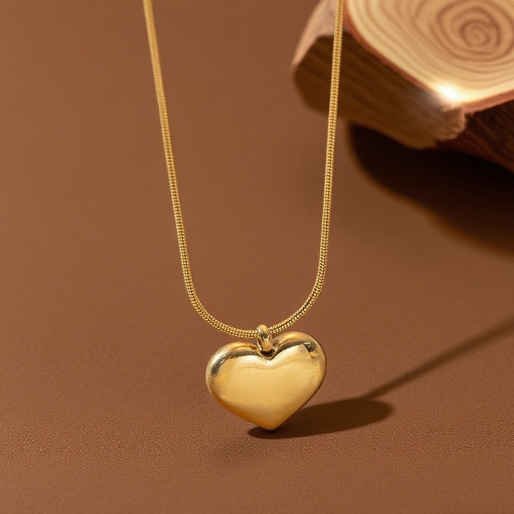 Collar corazón en color oro – corazón abombado